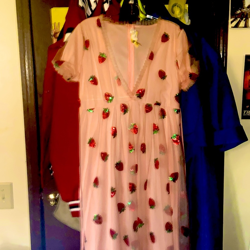 This is a low cut strawberry dress
